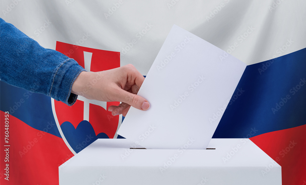 Elections, Slovakia. Election concept. A hand throws a ballot into the ballot box. Slovakia flag on background. Elections, Slovakia. Election concept. A hand throws a ballot into the ballot box. Slovakia flag on background.