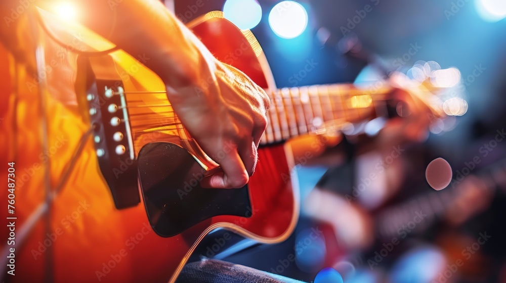 Obraz premium Talented guitarist in a professional recording studio passionately playing a captivating solo