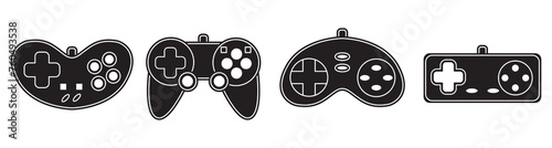 Vector game controller gamepad icons set. Black shapes joysticks elements flat style on white background. Gamer device collection