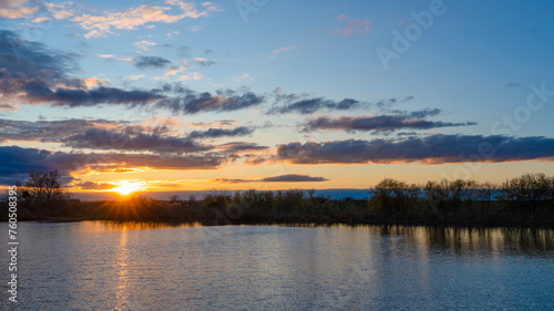 Beautiful landscape with sunset by the small lake