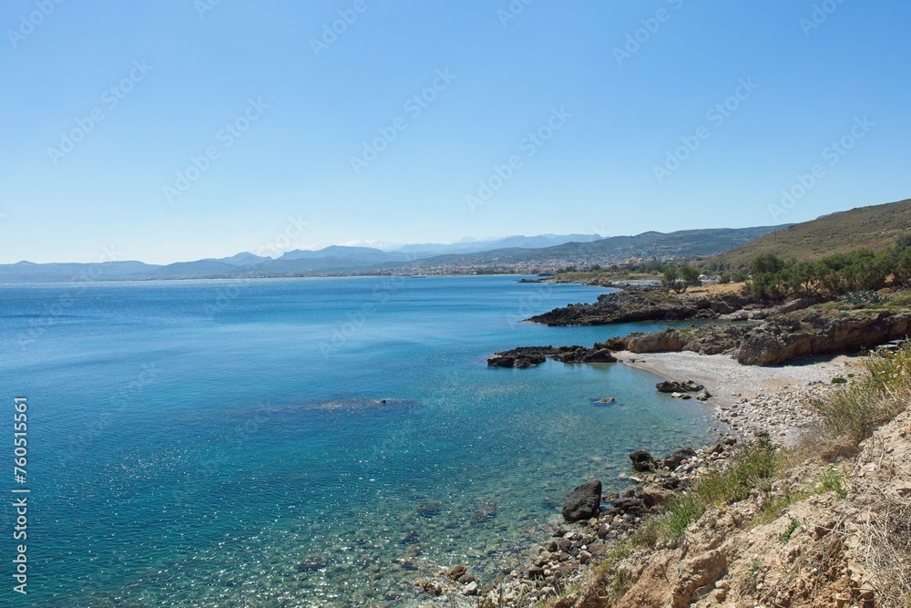 Landscape view of rocky seashore at Trachilos in sunny spring weather, Crete, Greece. Landscape view of rocky seashore at Trachilos in sunny spring weather, Crete, Greece.