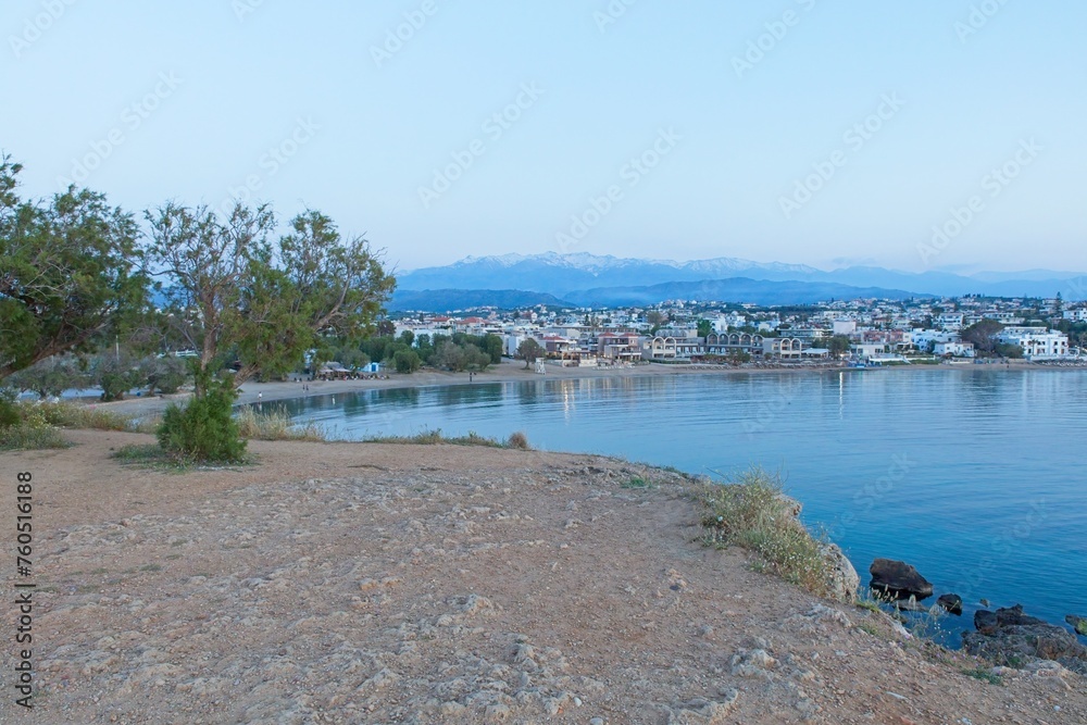 Landscape view of Sunset beach in the evening in clear spring weather, Agioi Apostoloi, Crete, Greece.