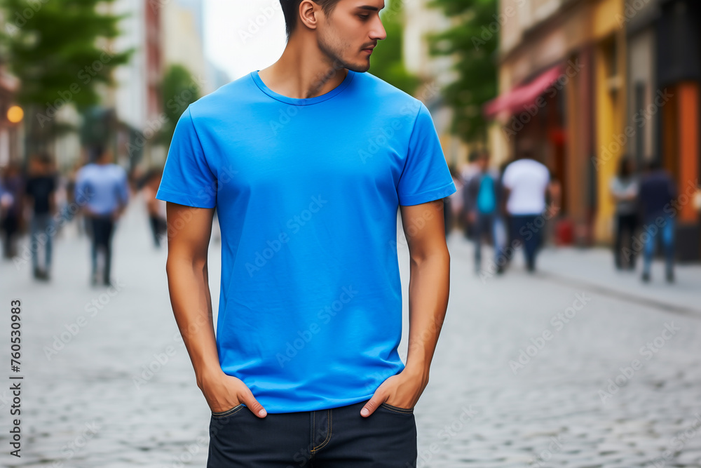 Young man wearing blank blue t-shirt outdoors. Mockup t-shirt template. Young man wearing blank blue t-shirt outdoors. Mockup t-shirt template.