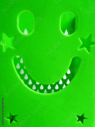 Green smile as a symbol of good mood