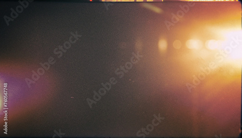Old film photography effect. Retro background. Vintage wallpaper. Frame 90s. Lens flare and heavy grain texture. photo