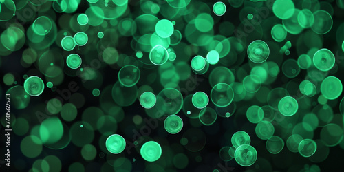 green bokeh background  Abstract green glowing lights bokeh on a black background  . A green light abstract background with defocused light particles and circles banner design