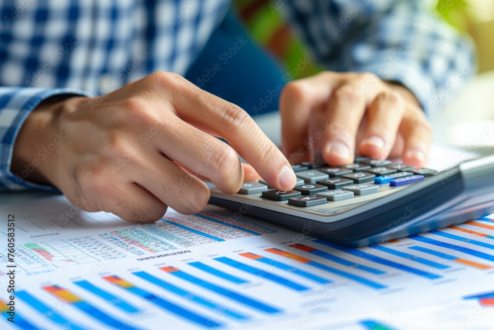 man working on a financial report, a financial report closeup, a man doing financial counting, financial businessman, finance report, a man with financial report and calculator man working on a financial report, a financial report closeup, a man doing financial counting, financial businessman, finance report, a man with financial report and calculator