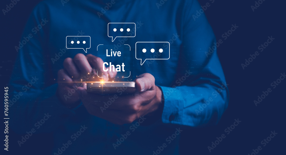 A close-up of a man's hands holding a smartphone, with Live Chat online communication and customer service technology, Chat with AI, Artificial Intelligence. Futuristic technology transformation. - obrazy, fototapety, plakaty 