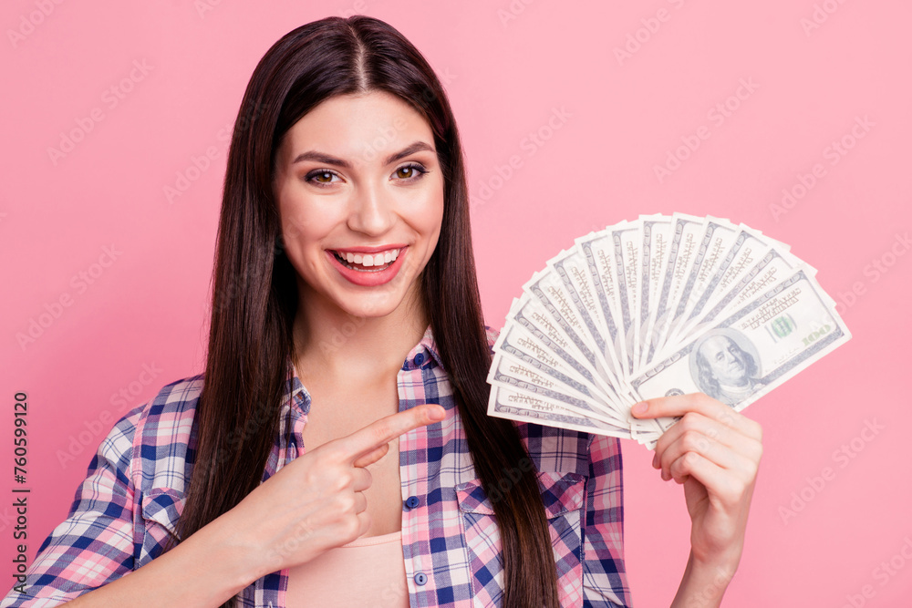 Close-up portrait of her she nice-looking attractive cute charming winsome lovely cheerful straight-haired lady recommending get big amount isolated over pink pastel background
