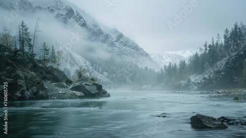 A serene river flowing through a snowy forest, with majestic mountains in the background. Perfect for nature and winter themed projects
