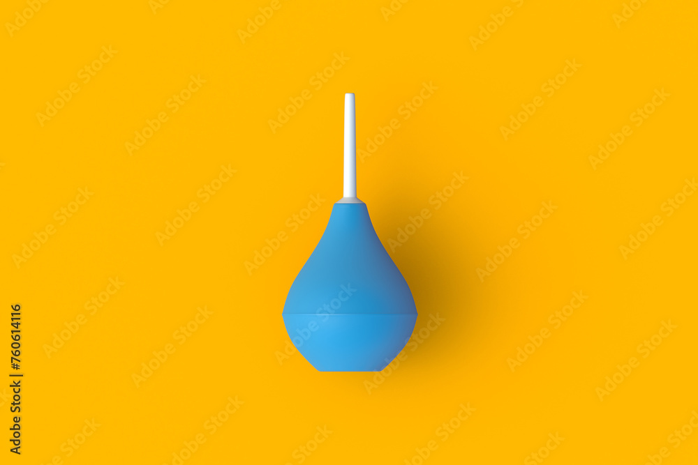 Enema on orange background. Rubber douching bag. Pear shaped syringe bulb. Medical clyster. Nasal aspirator. Laboratory tool. Constipation treatment. Top view. 3d render - obrazy, fototapety, plakaty 