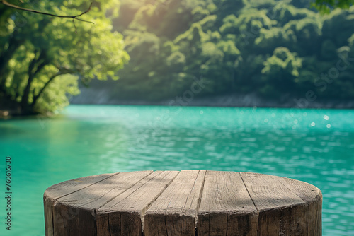 Empty wooden table on the water with a natural green forest background. For product display