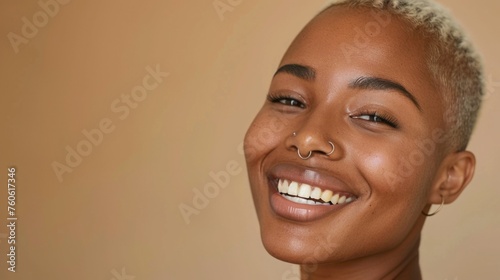 Portrait of a woman with a nose piercing, smiling. Suitable for lifestyle and beauty concepts