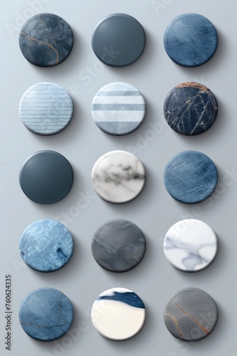 A collection of blue and white buttons on a gray surface. Suitable for fashion or crafting projects