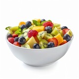 A bowl of fruit salad with strawberries, blueberries, kiwi, raspberries and mint leaves