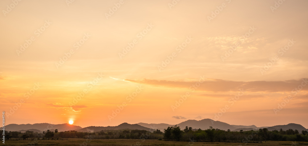 Fototapeta premium sunset over the countryside landscape