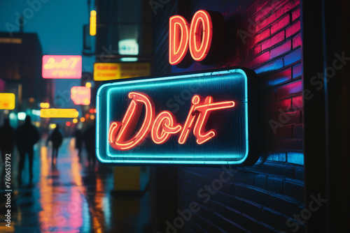 Slogan do it neon light sign text effect on a rainy night street, horizontal composition