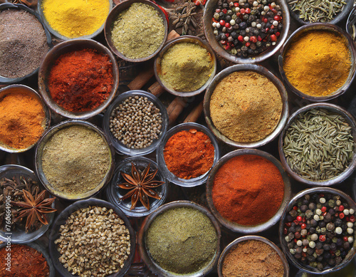 Colorful herbs and spices for cooking Indian spices © BHAGWATI