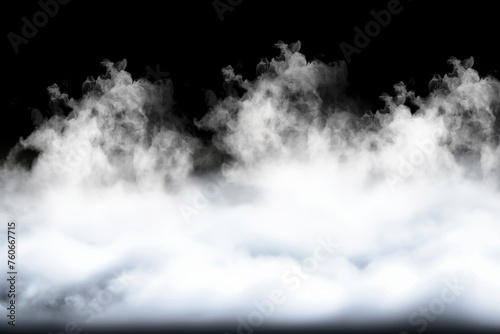 Thick smoke or steam cloud set against a black surface