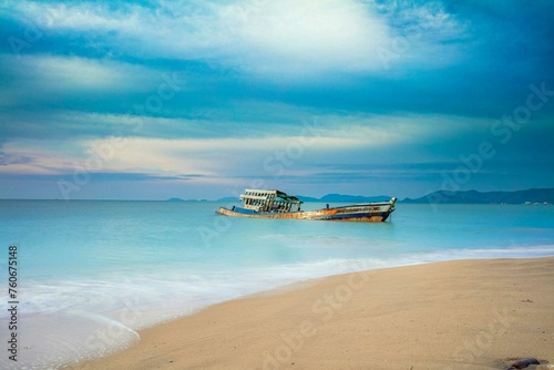 boat on the beach © Kashif