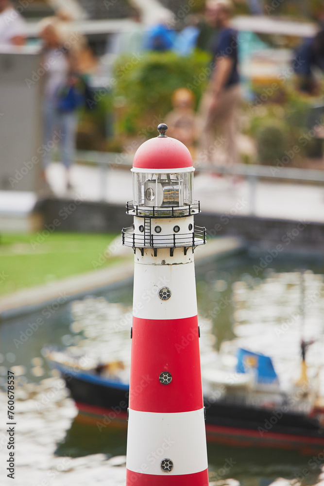 Toy lighthouse in a miniature city in the Netherlands Toy lighthouse in a miniature city in the Netherlands