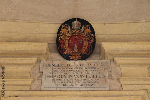 Santa Maria in Monticelli Sculpted Tablet Above the Entrance in Rome, Italy photo