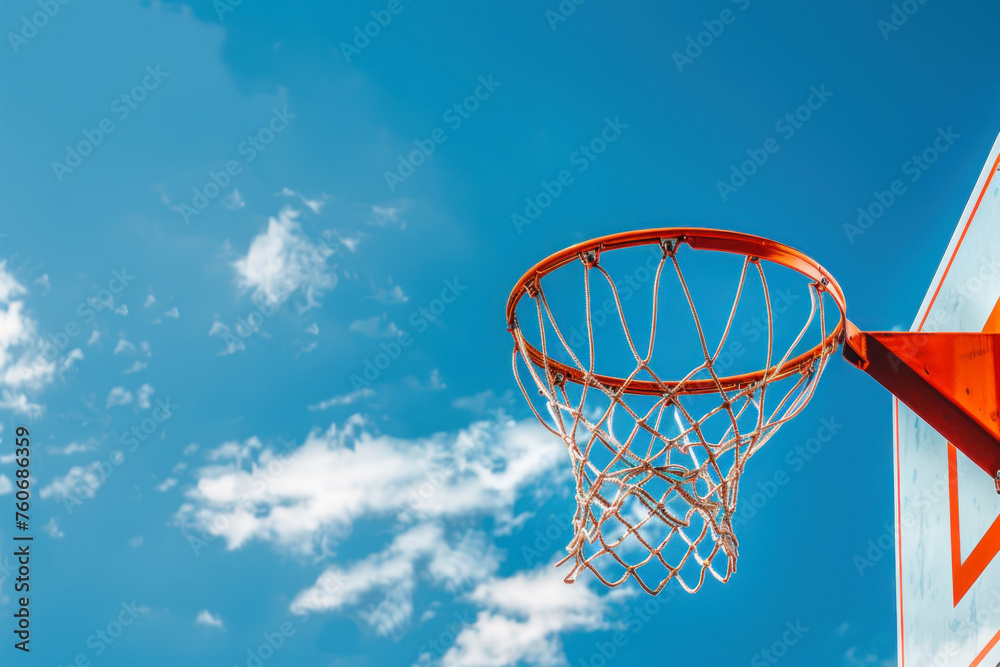 Basketball hoop on a background of blue sky, concept of Motion