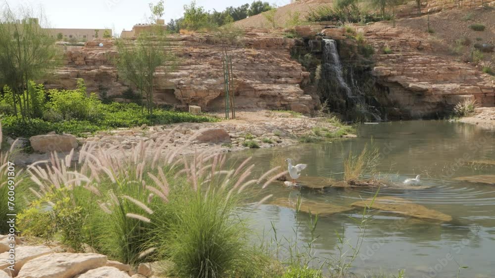 Cascading waterfall into pond. Day. Cascading waterfall into pond. Day.