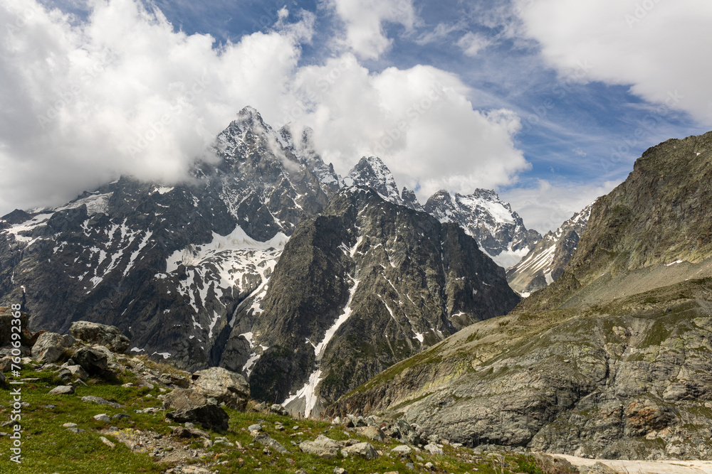 Cloudy alpine peaks