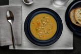 Photograph of a delicious hearty Vegetable Soup shot from above
