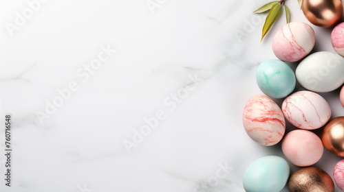 Happy Easter card  Series of eggs with marble stone effect painted with natural dye carcade flower on grey concrete background with blank space for text  top view  flat lay