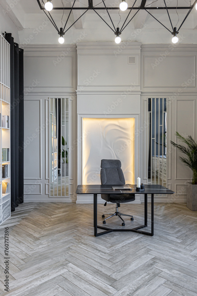 Fototapeta premium stylish cozy light bright luxurious spacious interior of a country house white walls with ornaments, fireplace, work area and recreation area without people during the day