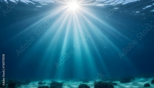 Underwater view with light rays penetrating the surface