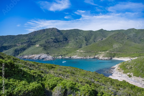 Corsica, seascape in the cap Corse, a creek with a boat 