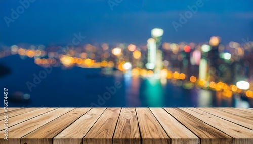 the empty wooden table top with blur background of an office and city exuberant image