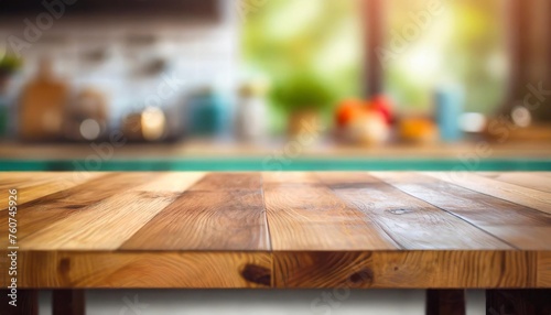 a wooden kitchen table with blurry background © Wayne