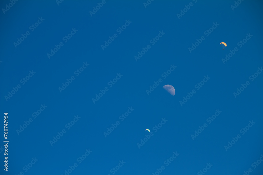 two parachutes and a half moon two parachutes and a half moon