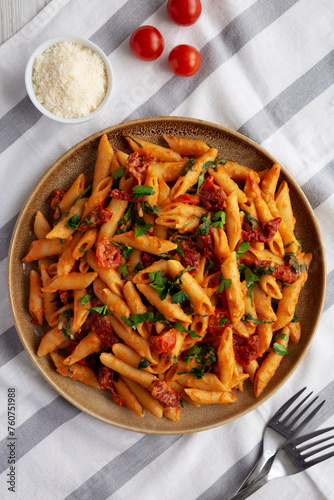 Homemade One-Pot Creamy Tuscan Pasta on a Plate  top view. Flat lay  overhead  from above.