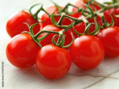 a cluster of vibrant red cherry tomatoes on the vine, with a focus on their shiny surfaces and the detail of their small green stems, conveying freshness and natural produce © romanets_v