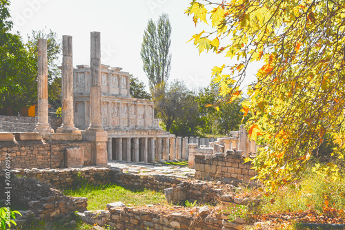 Sebasteion ruins at Aphrodisias, autumn leaves, columns, relief sculptures, clear daylight. Geyre, Aydin, Turkey (Turkiye) photo