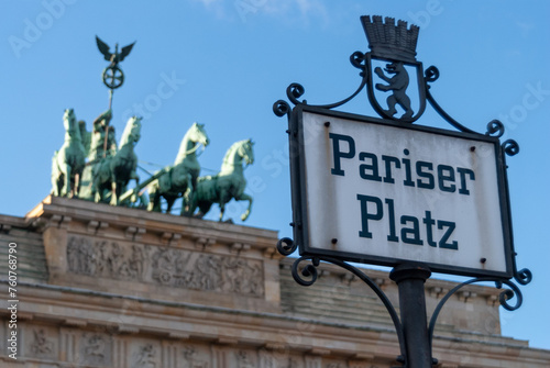 Iconic Pariser Platz Sign with Brandenburg Gate Quadriga in Background