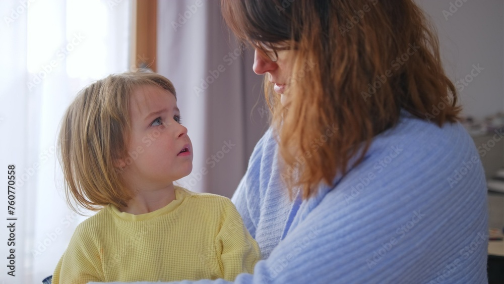 Concerned Worried Mother Checking Her Daughter Fever Body Temperature by Touching Forhead with Hand Palm Concerned Worried Mother Checking Her Daughter Fever Body Temperature by Touching Forhead with Hand Palm