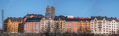 Panorama, old apartment houses on a hill and the towers Norra Tornen in the district Vasa Stan, a sunny winter day in Stockholm photo