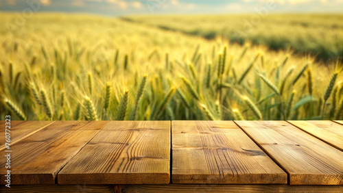 Wooden table with blurred wheat field background (ID: 760772323)