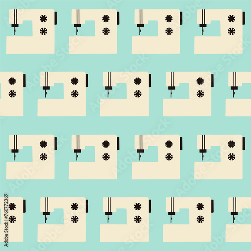 Beige white black sewing machines on a a plain kitschy 1950s soft sky blue background photo