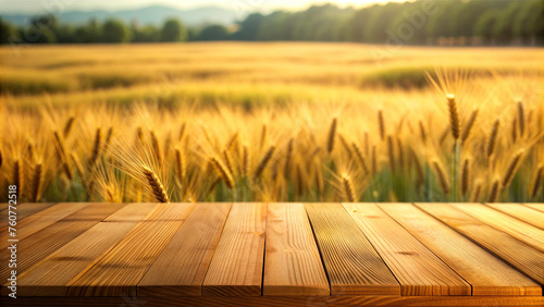 Wooden table with blurred wheat background (ID: 760772518)