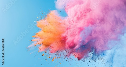 High-speed image of vibrant colored powder creating a cloud as it is propelled into the air