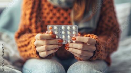 Woman holding birth control pills generative ai photo
