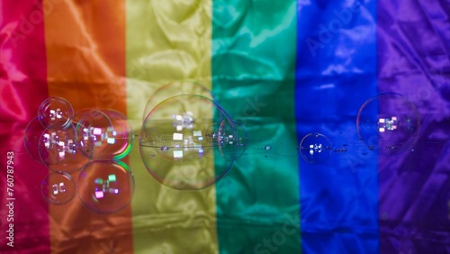 Wallpaper Mural Soap bubbles on rainbow glass surface with Gay and LGBT flag in the background Torontodigital.ca