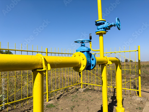 Yellow Gas Pipes with Blue Gate Valves